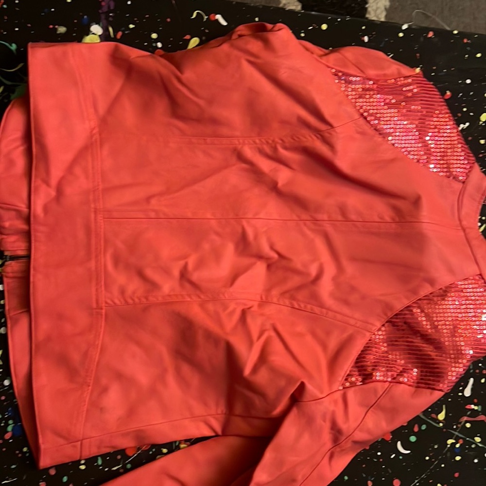 Leather orange jacket with sparkles